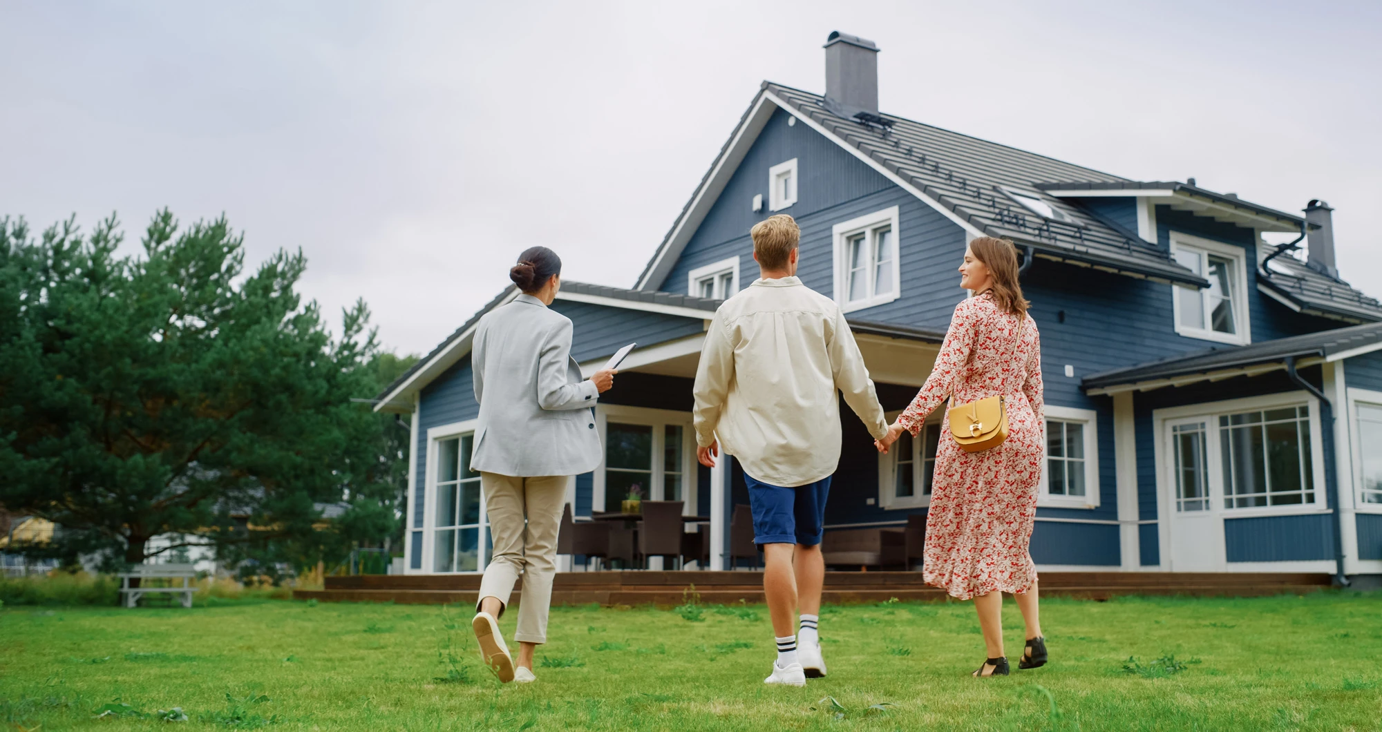 Agent showing a new home buyer a home
